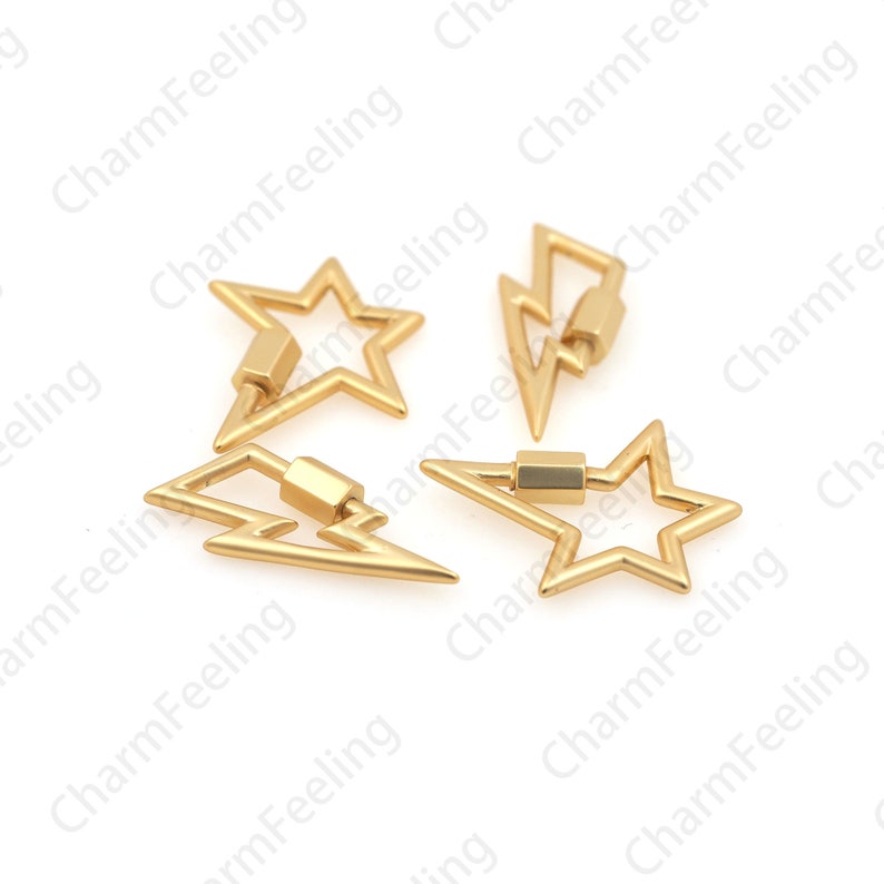 May include: Four gold-colored charm clasps in star and lightning bolt shapes. Each clasp has a screw-on closure. The clasps are likely for jewelry making or crafting. The background is white with the text "CharmFeeling" repeated.