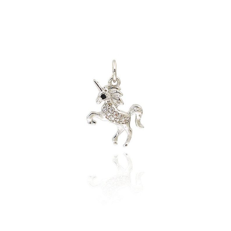 May include: A silver unicorn charm with clear and black rhinestones. The unicorn is standing on its hind legs with its head held high.