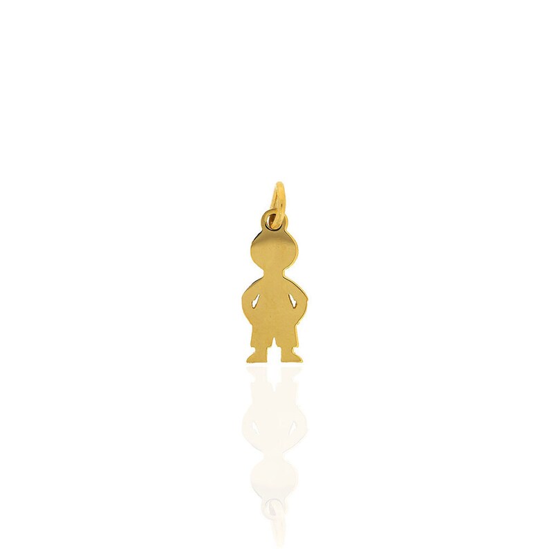 K&ouml;nnte beinhalten: Ein goldfarbener Anh&auml;nger in Form einer Kindsilhouette.
