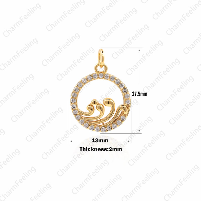 May include: Gold pendant with a circle design featuring a wave pattern and clear cubic zirconia stones. The pendant measures 4.4 cm in diameter and 1.3 cm in thickness.