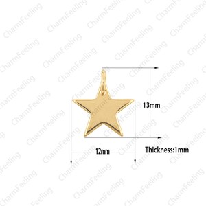 May include: Gold-toned metal star charm with a loop for attaching to a necklace or bracelet. The star is 12 mm wide and 13 mm tall. The charm is 1 mm thick.