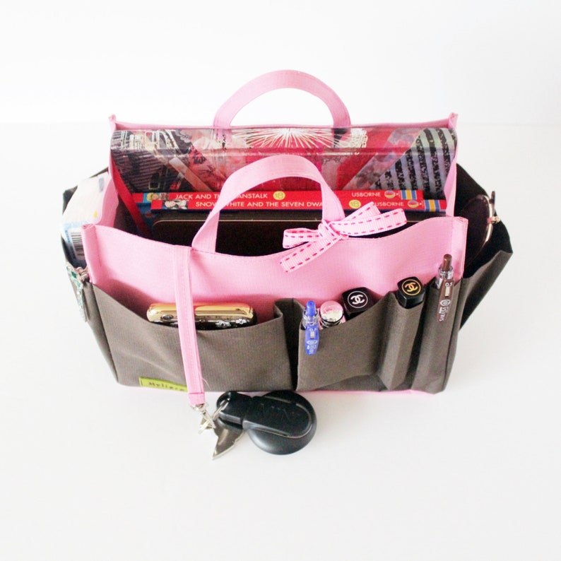 Waterproof sturdy bag liner organiser, large size. Lightweight and perfect for any bags with 11 compartments. Protect your inner handbags from liquid stains and keep everything visible-neatly arranged. Dimensions: L.25 x h.18 x w.12cm. High Quality.