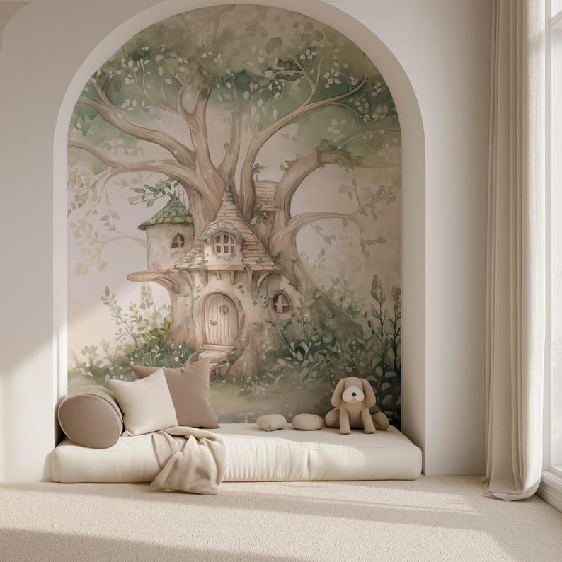 May include: A wall mural featuring a watercolor illustration of a treehouse nestled within a large tree, set in an arched alcove. A beige floor cushion with two pillows and a plush dog toy are positioned in front of the mural on a carpeted floor.