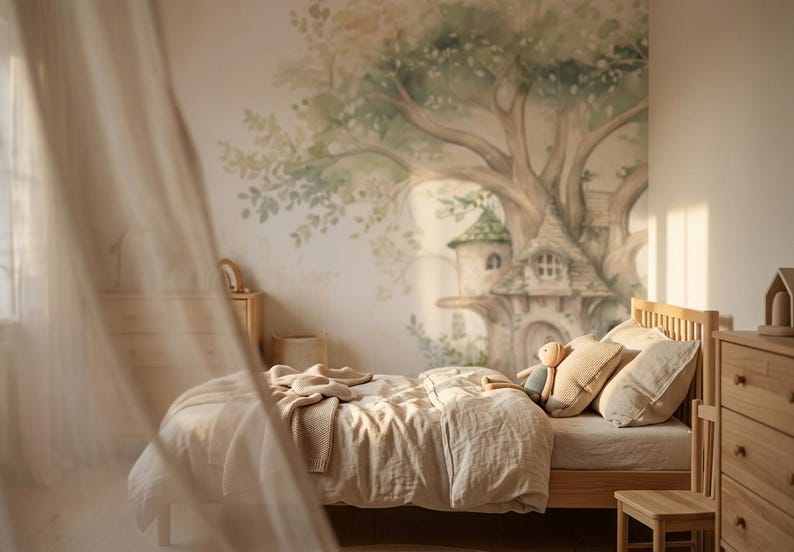 May include: A wooden bed frame with light beige bedding and pillows, positioned against a wall featuring a large, soft-toned watercolor mural of a treehouse. The room includes light wood furniture, a small chair, and a soft, warm lighting scheme.