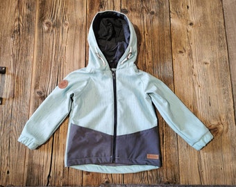 Softshelljacke 'Reflektor' hellmint mit reflektierendem Muster Regenjacke Jungen Mädchen Unisex