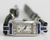 A Fine Ladies Platinum Sapphire and Diamond Benson Cocktail Watch