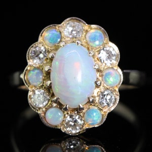 Tantalizing Opal and Diamond 9 carat Gold Cluster Ring
