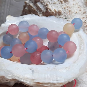 1x strand of agate balls 10 mm color mix pastel matt = 39 pieces