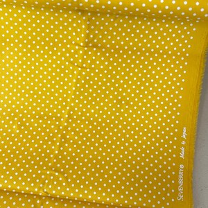 Sevenberry - Japanese cotton fabric in sun yellow with white dots - print visible on both sides