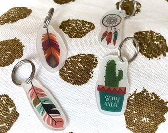 Charms, shrink wrap keychains, cactus, dream catcher and feathers