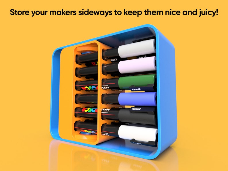 POSCA Paint marker holder case in orange and blue. Case is shown in closed position laying on its side holding 18 POSCA PC-3M Paint markers.