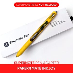 May include: A yellow Supernote pen adapter for Paper Mate Inkjoy pens. The text "SUPERNOTE REFILL NOT INCLUDED" is printed on the white box. The pen is on top of the box.