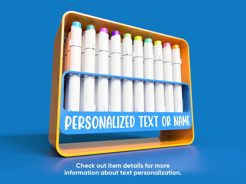 May include: A yellow and blue marker holder with white markers. The markers have colorful tops. The holder has the text "PERSONALIZED TEXT OR NAME" on the front. The background is blue.