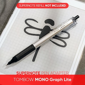 May include: A silver and black Tombow Mono Graph Lite pen adapter for Supernote, on a grid-lined notepad with a dragonfly design. The text "Supernote Refill Not Included" and "Supernote Pen Adapter Tombow Mono Graph Lite" are visible.