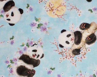 0.5 m fabric with panda bears / cherry blossoms, light blue