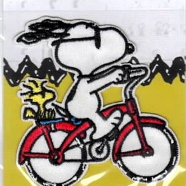 Peanuts© Bügelbild, Snoopy / Fahrrad