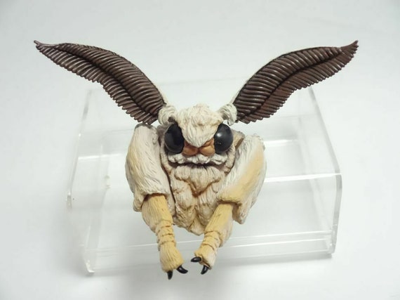 Plastic moth store toy