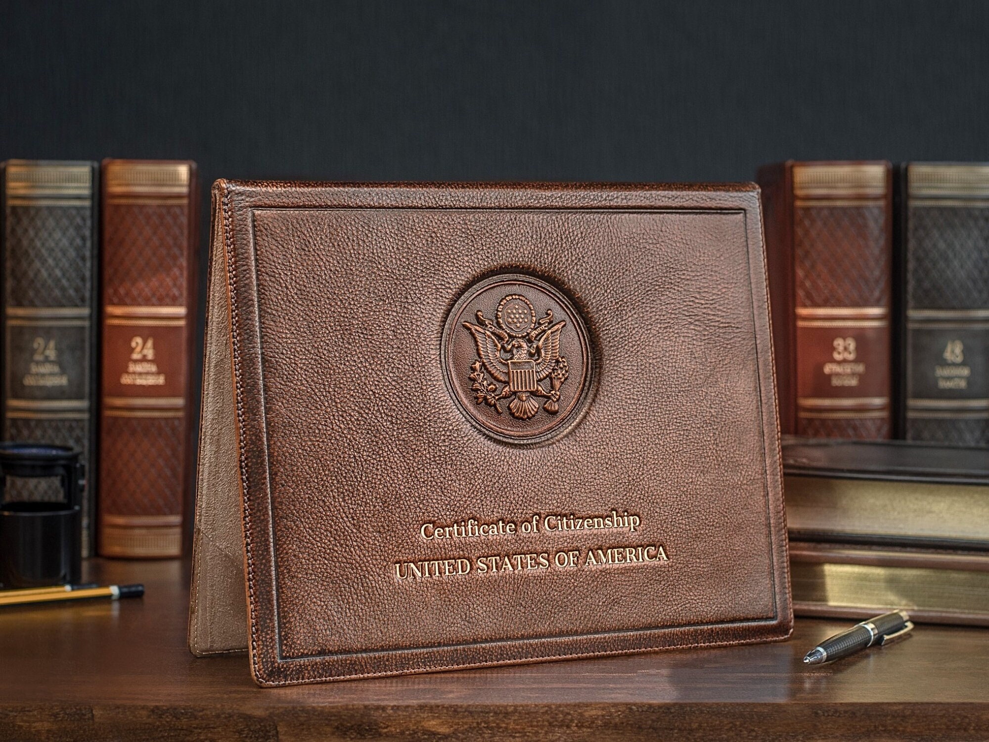 US Citizenship Naturalization Certificate Cover Of With Gold Logo ' Certificate Of Citizenship
