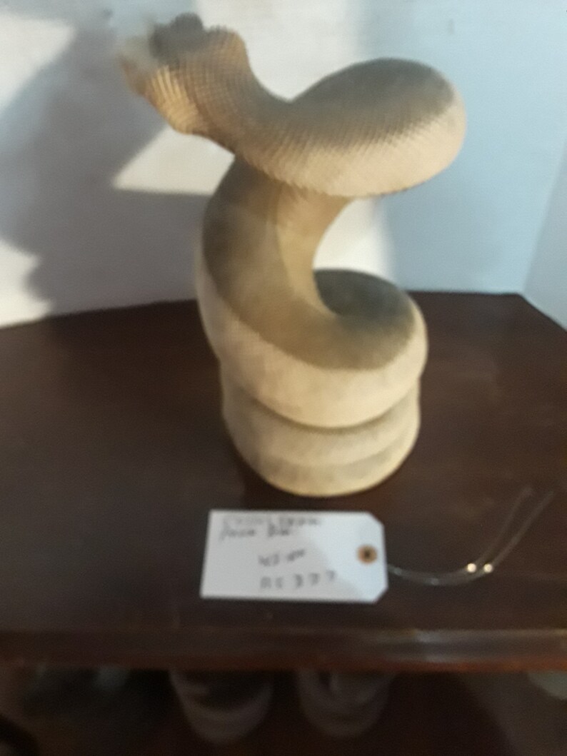Snake coiled from Bali hard wood some teeth missing