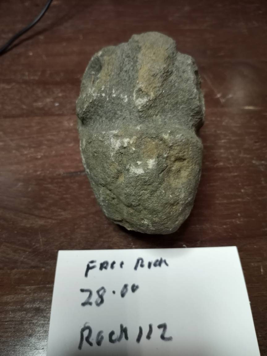 Face rock hand carved by the people of the Dominican Republic  old