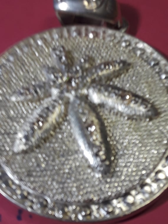 Marijuana medallion  leaf turns - image 4