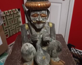 Wood carved native with instrument from Bali vintage