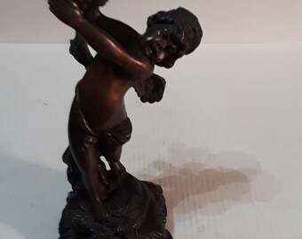 Angel child candle holder  bronze