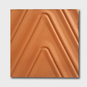 May include: A terracotta tile with a textured, geometric pattern of overlapping, curved, chevron shapes.