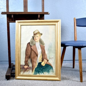Dipinto ad acquerello M. Piotrowski 1943 donna maschile con cappello e cappotto disegno vintage anni '40