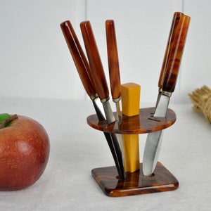 Catalin fruit knife set 50s amber honey colors mid century rockabilly vintage nostalgia kidney table era retro modern Katalin