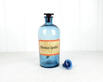 rare old apothecary bottle in blue Phenolum Liquefactum 1.25 liter carbolic acid glass bottle pharmacy laboratory bottle storage vintage