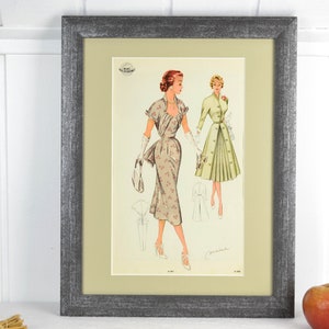 Image des années 50 WEMO mode vêtements modernes de la femme nouvellement encadrés avec style passe-partout milieu du siècle vintage design mural Brocante années 60