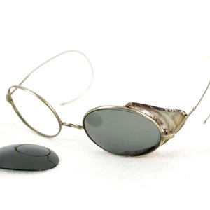 Rare sunglasses with fold-down side shields, decorative object, hobbyist item, grey tinted lenses, non-prescription, circa 1900-1910, wire temples