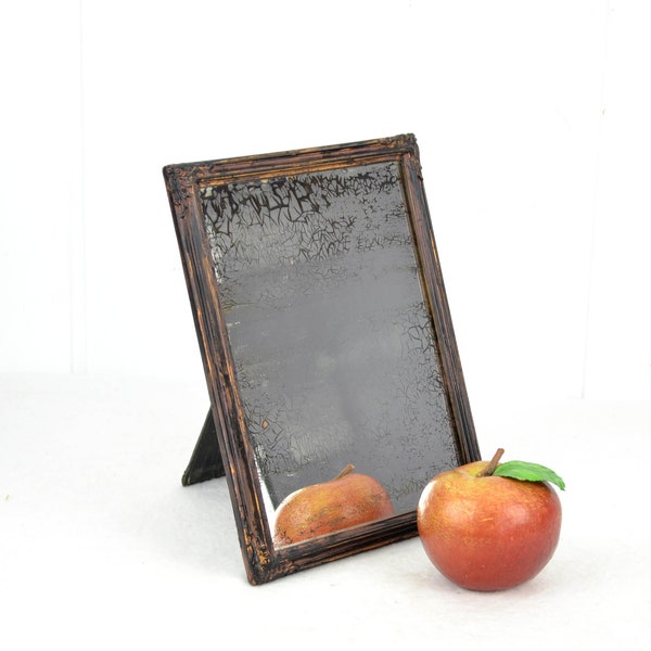 Small table mirror wall mirror 19th century with blind spots stains cracks mirror antique wooden frame vintage design nostalgia rustic