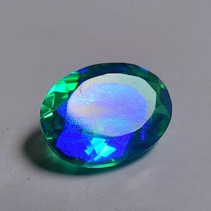 Oval Peacock Quartz Doublet Gemstone: 8 Carat, 14x10mm