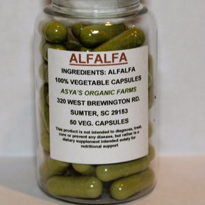 May include: A clear plastic bottle filled with green capsules labeled "ALFALFA" with the ingredients, "ALFALFA 100% VEGETABLE CAPSULES", and the company information, "ASYA'S ORGANIC FARMS 320 WEST BREWINGTON RD. SUMTER, SC 29153 50 VEG. CAPSULES". The label also includes a disclaimer that the product is not intended to diagnose, treat, cure or prevent any disease, but rather is a dietary supplement intended solely for nutritional support.