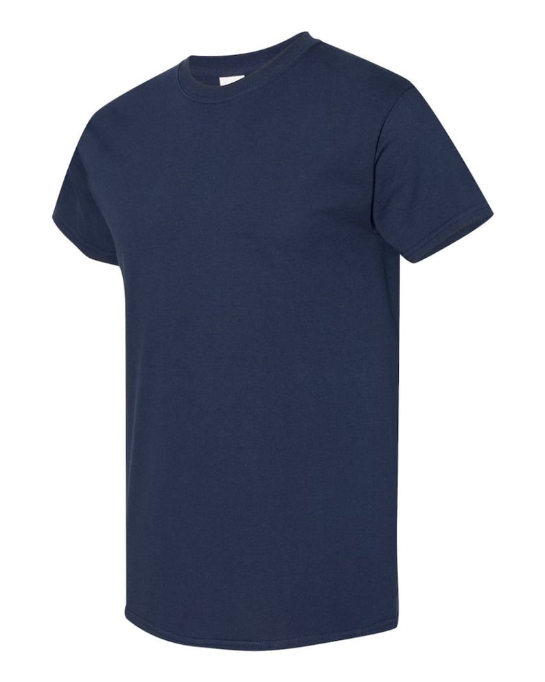 May include: A plain navy blue t-shirt with short sleeves.