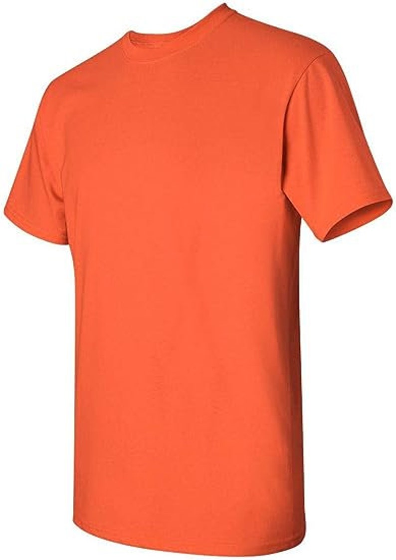 May include: A plain orange short-sleeved t-shirt.