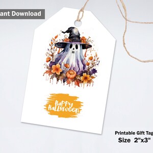 May include: A white rectangular gift tag with a hole and twine, featuring a watercolor illustration of a ghost wearing a black witch hat surrounded by orange flowers and pumpkins, with the text Happy Halloween on an orange brush stroke.