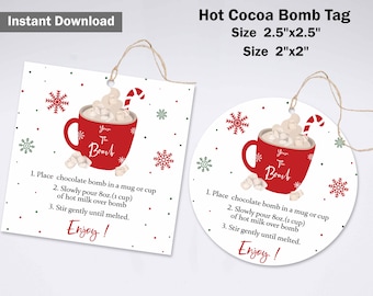 May include: Two tags for hot cocoa bombs. One is square, the other is round. Both feature a red mug with marshmallows and a candy cane. Text includes instructions and the words "Enjoy!" and "You're The Bomb."