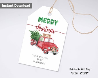 Può includere: Un'etichetta regalo bianca con un camion rosso che trasporta un albero di Natale. Il testo "MERRY christmas" è in verde e rosso. Il testo "YOUR CUSTOM TEXT GOES HERE" è sotto. L'etichetta misura 5 cm x 7,6 cm.