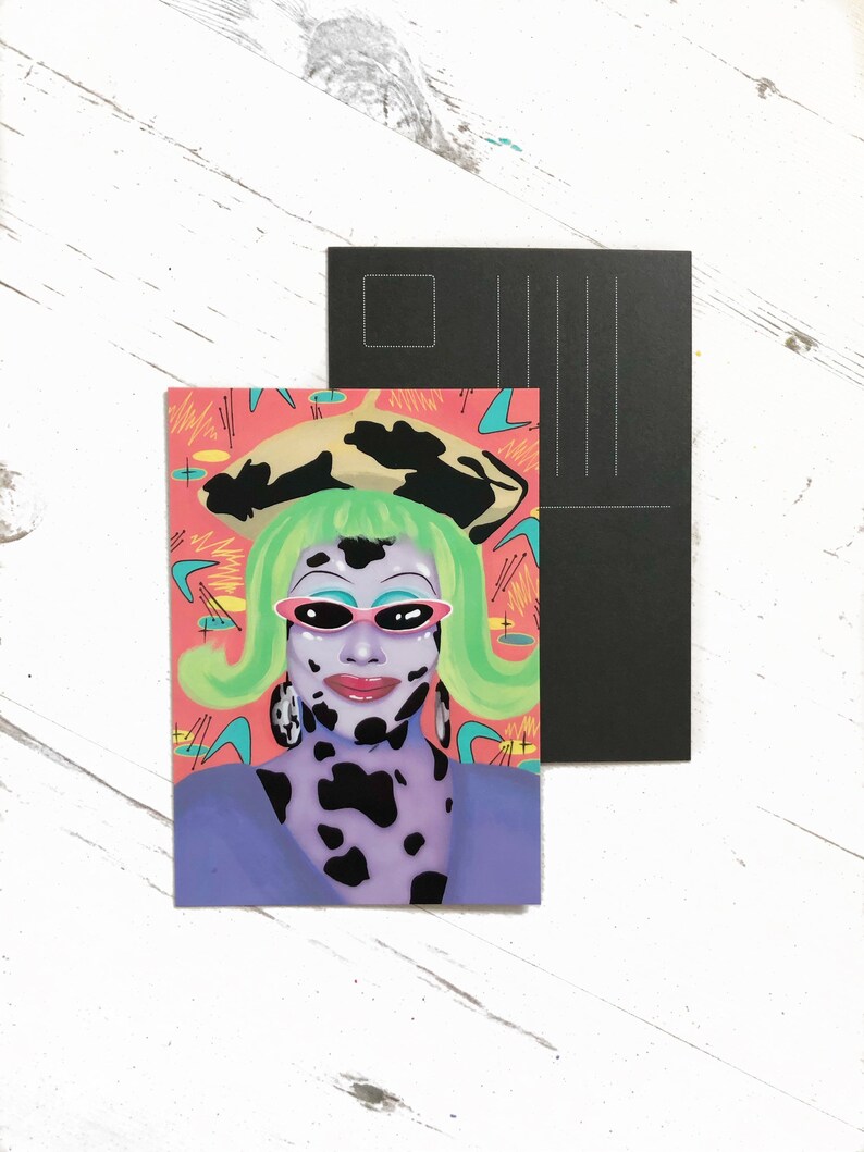 May include: A postcard featuring a colorful illustration of a person with green hair, wearing a black and white spotted outfit, pink sunglasses, and a black and white hat. The background is a pink and blue abstract design.