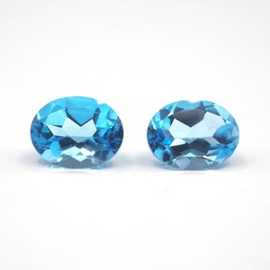 Swiss Blue Topaz Oval Shape 10 x 8 x 3.5 mm & 10 x 8 x 4.5 mm Approximately 6.23 Carat, 2 Pieces (GTG-TO-67)