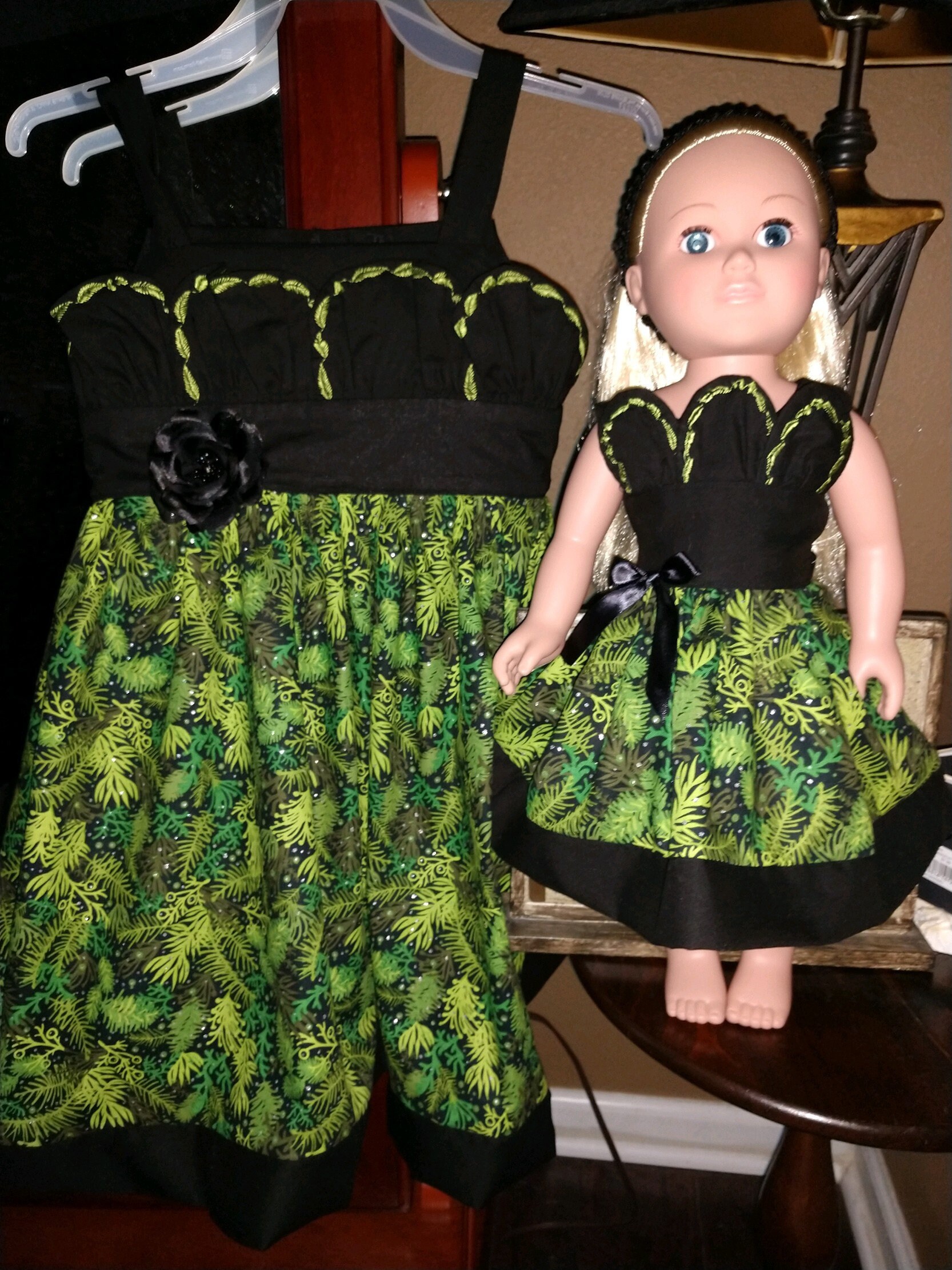 girl and doll matching christmas dresses