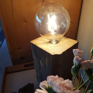 Design lamp made from old oak beams