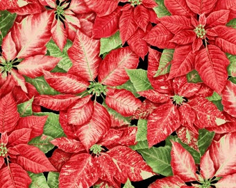 Patchwork fabric poinsettia on a green background