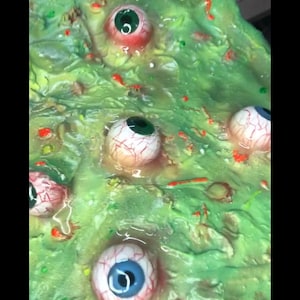 EYE-PUKE novelty gag gift fake rubber puke with fake eyeballs Halloween decor