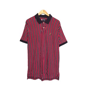 May include: A red and black striped short-sleeved polo shirt with a small embroidered logo on the chest. The shirt has a black collar and cuffs.