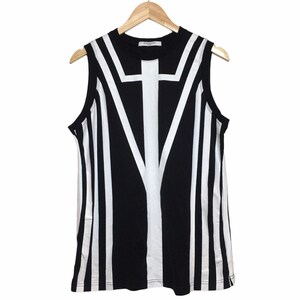 May include: A sleeveless black and white striped tank top with a white graphic design. The graphic design features a large white Y shape with a horizontal line across the top.