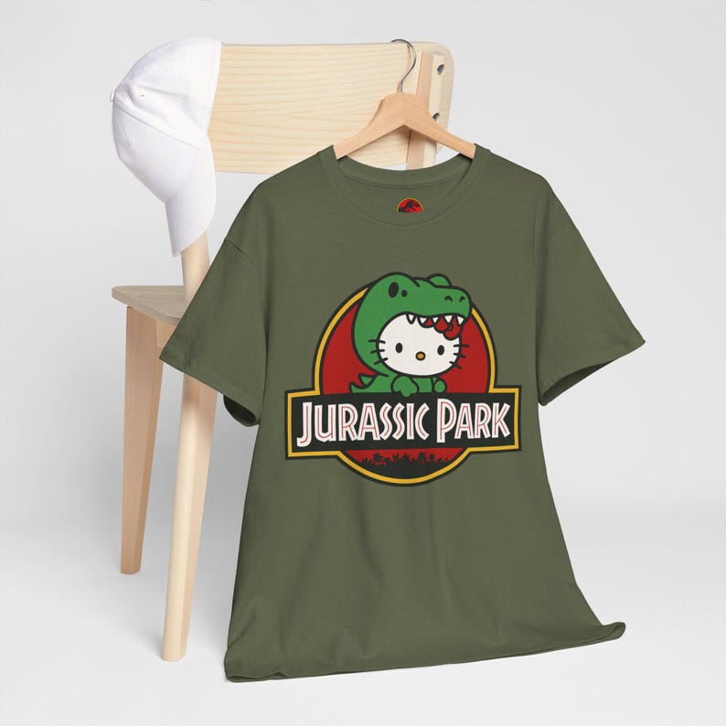 Hello Kitty Jurassic Park T-Shirt | Kawaii Dinosaur Mashup Tee | Cute Pink Graphic Shirt | Unisex Cotton Tee | Funny Movie Crossover Gift image 8